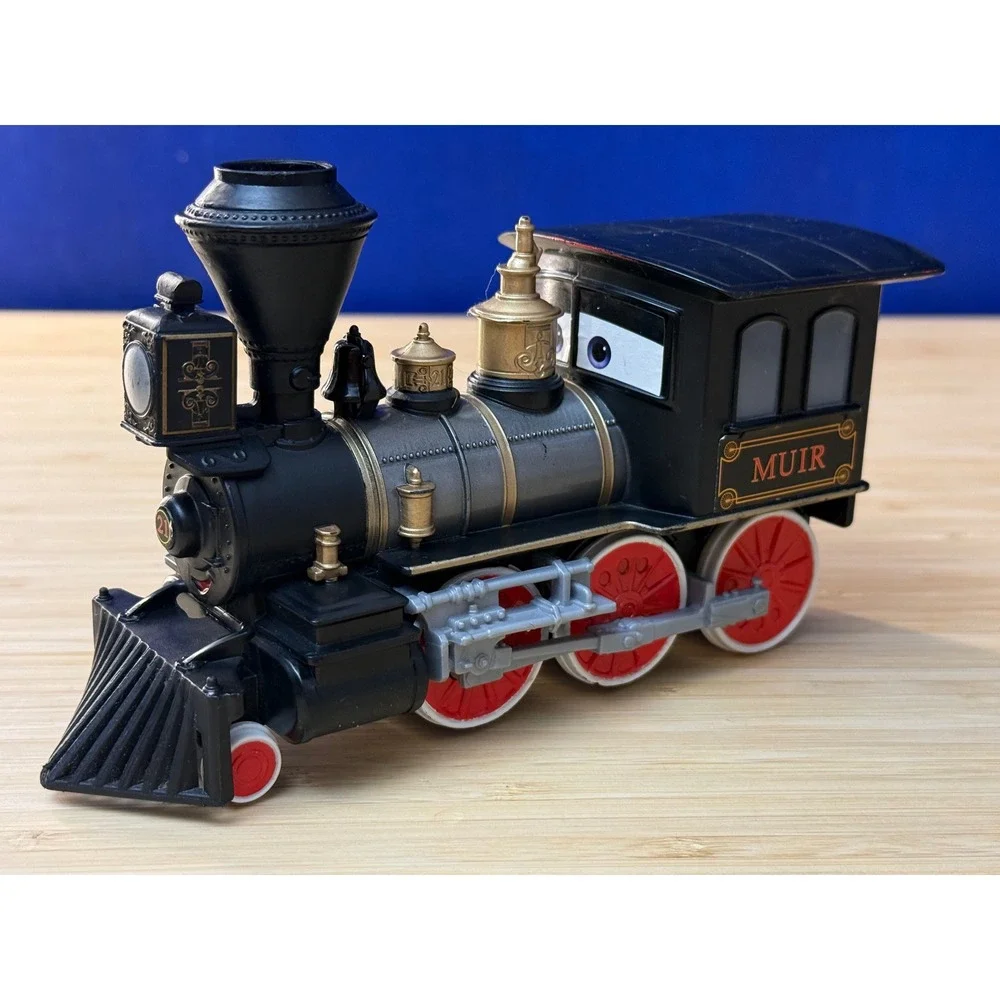 Disney Pixar Cars Muir Deluxe Train Engine Black Gold Steam Locomotive Toy